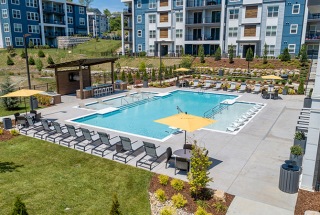 outdoor swimming pool with kitchen area