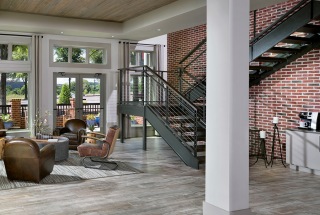 two-story clubhouse with coffee station and social seating areas