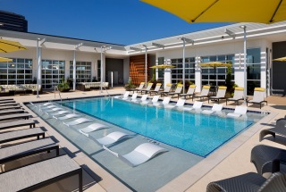 outdoor pool with in-pool lounge chairs